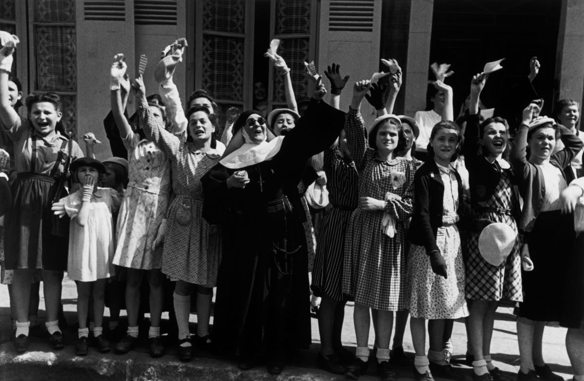 Civilians welcoming American troops just after the liberation, Alençon, France, 12 August