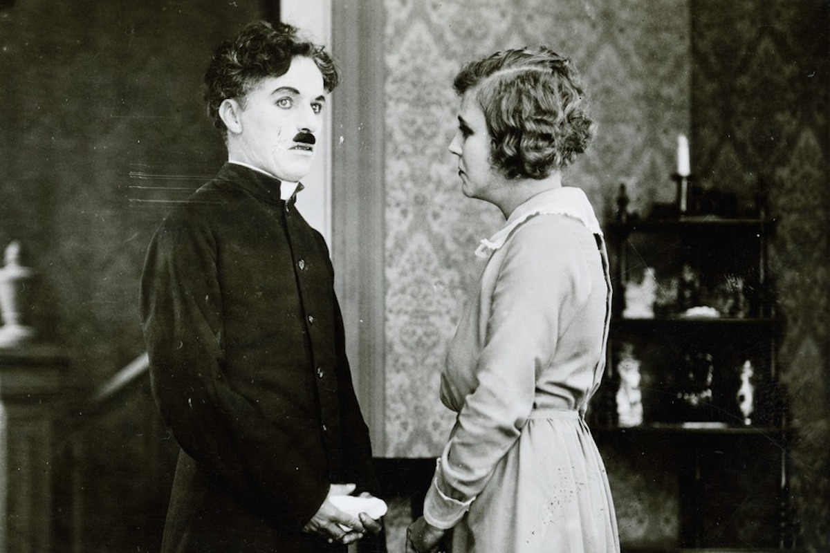 Charlie Chaplin,e Edna Purviance inThe Pilgrim (Il pellegrino, US 1923) di Charles Chaplin